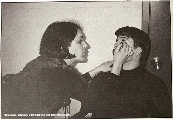 Brian applies eyeliner to Dave